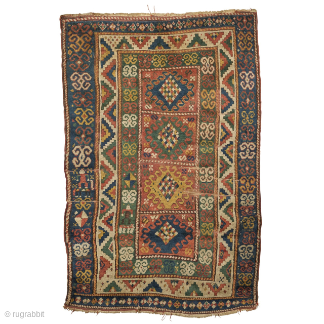 Early to mid 19th century Kazak with two human figures. Photographed filthy and pre restoration
Approximately 4' x 6' available as is            