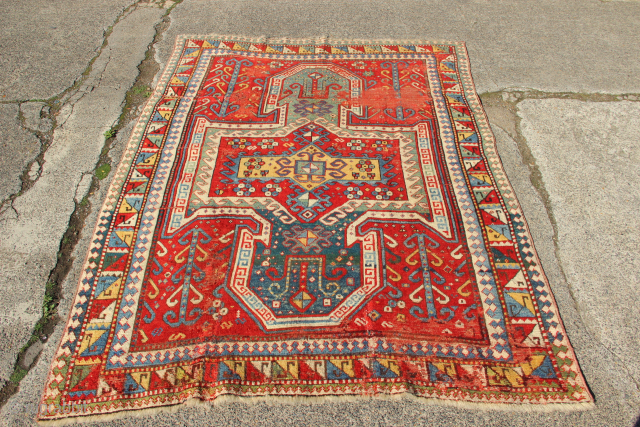 Uplifting ancient old Sewan Kazak fresh from a private collection. Ive not seen the Star Kazak border on anything but a Star Kazak.
The very best colour and typical wrinkly old Kazak weave. ...