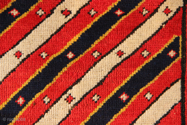 One of my all time favourite rugs, an early shirvan long rug with diagonal stripes, detail.
Please contact for more info, thanks            