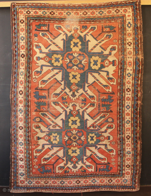 Antique Chelaberd or Eagle Kazak with various problems; worn, repaired and with homespun repairs, please see photos. priced accordingly!
4'2" x 6'1" / 126 x 185cm
