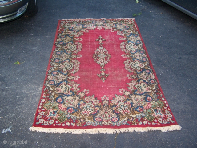 ok this is an nice old handmade kerman rug i believe 1920's or 30's .
nice rug does have wear in field of rug . 

rug size is 6ft 8in x 3ft 9  ...