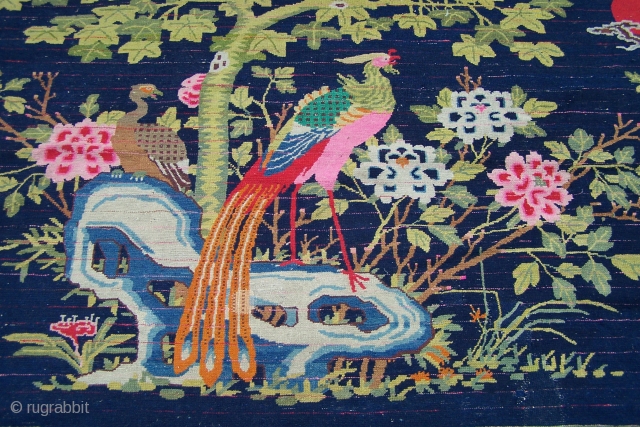 Chinese Carpet, (main image is from the back) early 20th.century, has some synthetic colours and (I count) five patch repairs, otherwise pile in reasonable condition, replaced side selvages, 180 x 276cm  