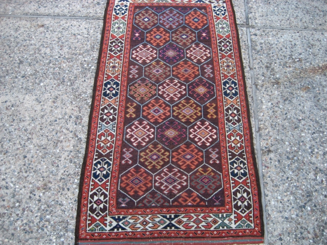 Belouch 2' 11" x 5' 8".

Not sure how to identify this one.  It has elements of both Belouch and Kurdish (Quchan?) weaving.  Low-ish even pile, ends are intact, with one  ...