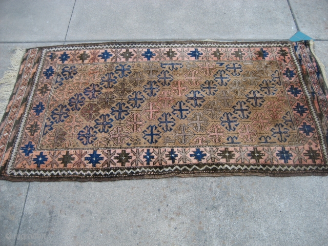 Belouch 2' 6" x 4' 9" in nice condition.  Full pile condition end-to-end.  The rug had been hanging for many years and still has 5 brass rings attached.  The  ...