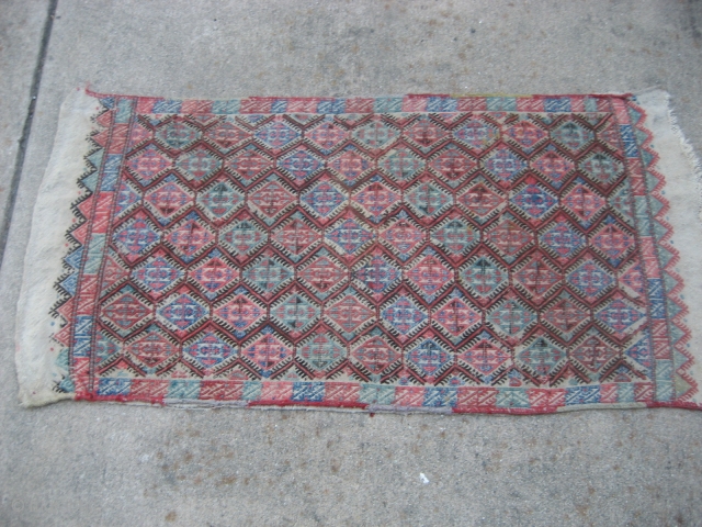 Anatolian Soumak Grain Bag Face.  Size 20" x 41".  Good condition with large kelims at both ends.  one kelim end could use stopping.  Edges in good condition, needing  ...