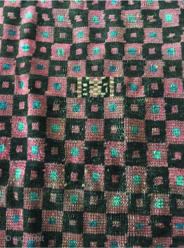 This is a very rare 19th century Chodor Turkoman small rug. 
Possibly made for a wedding rug. Very simple unusual overall
design. With a simple and subdued Chodor pallett.     