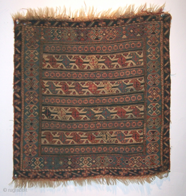 Shahsavan bagface, 19th C.
Splendid colors, esp. aubergine, teal blues, and wheat.
Missing very outermost guard, otherwise great shape. Fine weave.

Note: usual apologies for my poor photographic skills. This piece is quite beautiful, with  ...