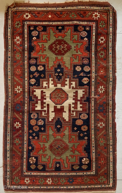 19th Ca Kazak weave with Leshghi star
Old Repairs.  Colors Bright and sound.
5'3"x3'1"                    