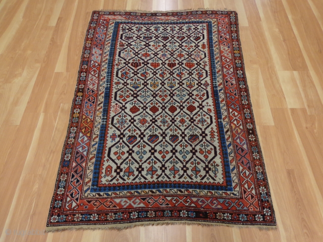 https://jessiesrugs.com/caucasian-rugs/1190-antique-oriental-rug-3-8-x-5-1-ivory-caucasian-daghestan.html

This antique Caucasian Daghestan rug is in good condition. The design features a beautiful all-over pattern set in an ivory field with red and blue highlights. There is some wear on the  ...