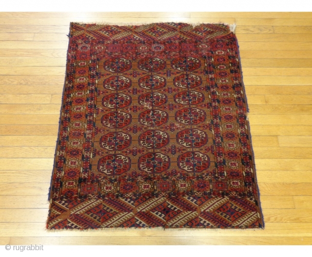 http://lesniakorientalrugs.com/584-turkoman-oriental-rug-3-2-x-3-10-brown-bokhara.html

This antique Turkoman Bokhara rug is in fair condition. The design features six rows of three medallions set in a rich brown field with red, black and cream highlight colors. There is  ...
