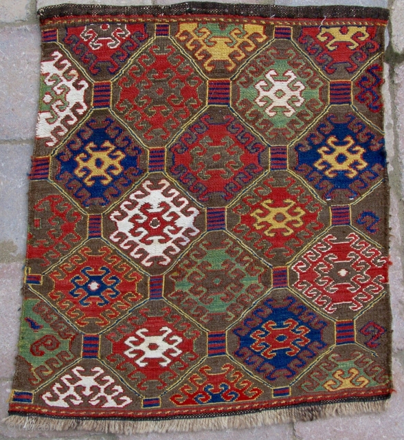 Shahsavan mafrash end panel, circa 1900, 20”x18”.  Excellent condition and all saturated natural colors.  White is cotton.  No damages or repairs.  The repeating latch hook octagons are varied  ...