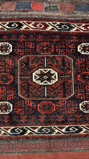 A pair of Baluch bags with star centers and curling leaf borders. Excellent condition with just some age-appropriate etching. One bag has a small ancient patch shown in the detail. The bags  ...