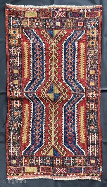 Antique Anatolian yastik. 63cm X 106cm. Unusual and technically astute reverse brocade weave. Professionally mounted on linen. Good saturated colors. Original sides. As pictured, etching in the dark brown yarns, a couple  ...
