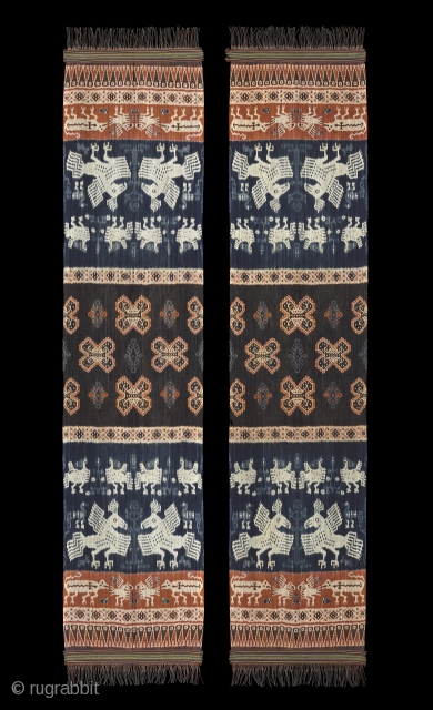 TE02181

1970s Pair of Hinggi Kombu, man's ceremonial shawl, cotton with indigo and orange and dark purple brown ikat patterns. Natural dyes. Sumba people, woven in Umbu Ungngu, house of Uma Wara, Rende,  ...