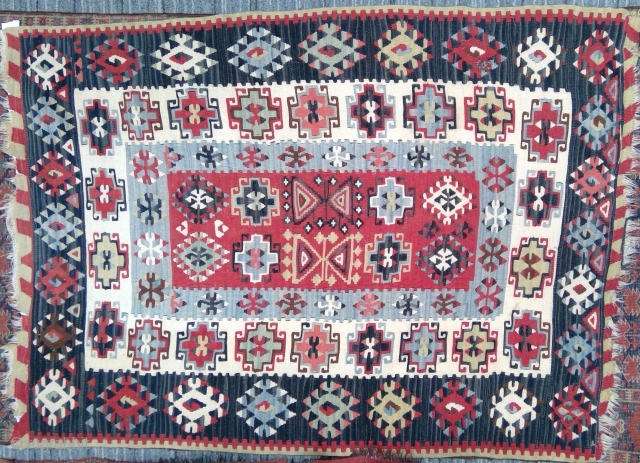 Handsome little Anatolian kilim featuring Memling guls, 3'8" x 5'1". Lively colors appear to be natural dyes with plenty of abrash; no fading and no color run. In good condition, with minor  ...