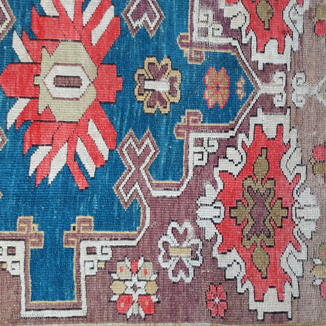 Decorative antique Ada Milas knotted pile wool rug, 4'4" x 6'7", with interesting unusual older design, late-19th century fuchsine, two holes and damaged ends, priced accordingly USD 245.- please use johnbatki#gmail.com  