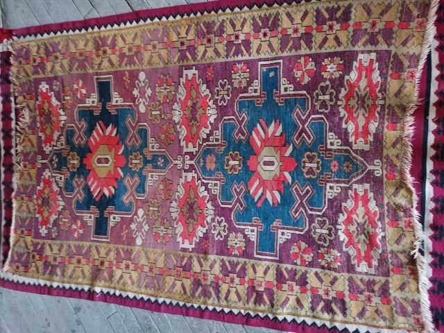 Antique Ada Milas rug with unusual design, faded fuchsine and end gouge. USD 325.-  johnbatki@gmail.com                 