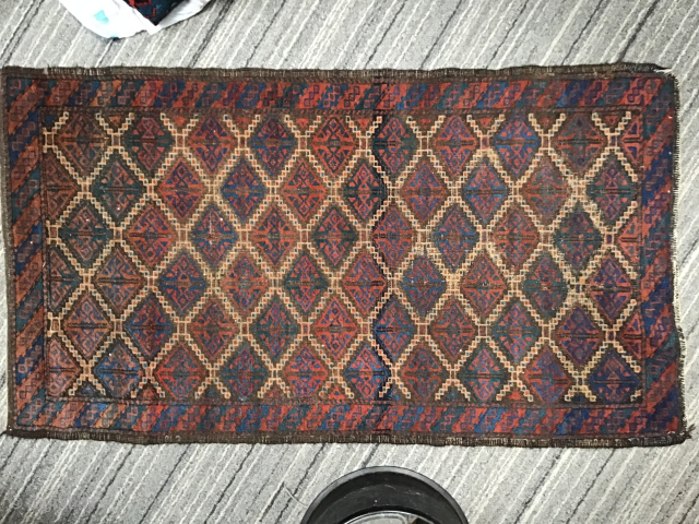 Antique Baluch small rug: Geometric Gul motif in Diamond Lattice repeat with crisp camel hair stepped outline. 33 x 58 inches.  Brilliant blues. Very good condition. Inexpensive. johnbatki@gmail.com    