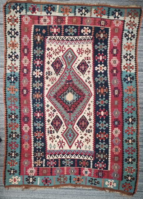 Antique SouthEast Anatolian small kilim, 48 x 62 inches. Wool, white cotton, metal-wrapped highlights. Excellent condition. Please contact johnbatki@gmail.com              