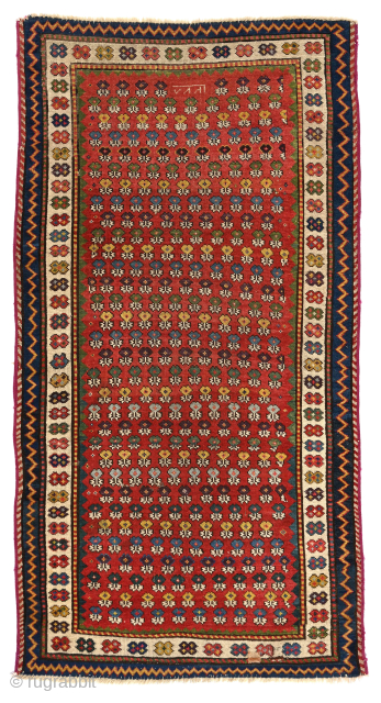Dated 1861 Moghan or NW Persian rug with colorful florets on red field. Superb colors,overall good condition, with slight losses at edges, sides re-wrapped. 37 x 68 inches / 94 x 173  ...