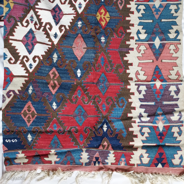 Antique Anatolian Aksaray kilim panel complete with knotted warp fringe, excellent condition save for 3 small holes and one crudely repaired small gouge at edge. Superb saturated colors include ample use of ...