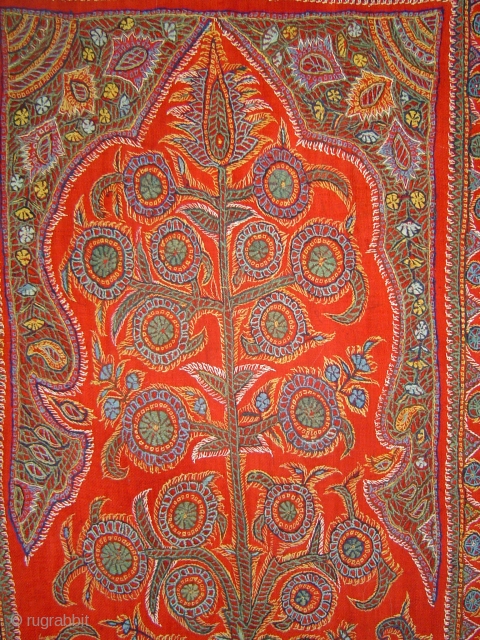 Kirman Tree under Arch embroidery, wool on fine red pashmina plain weave. 30 x 108 inches. Circa 1900.               