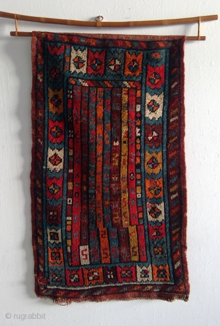 cute little early 20th century anatolian yastik, probably West Anatolia, maybe Makri region. Red wefts. most likely contains syntheric dyes.Recently hand-washed.
One hole visible in lower left corner, two other smaller ones in  ...