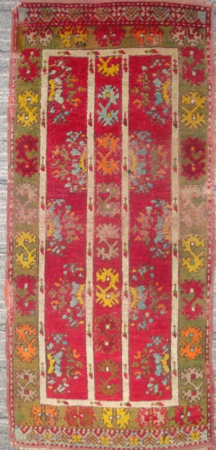 Highly unusual antique Anatolian yastik, 19 x 43 inches. I have not seen this design before. The motifs resemble those seen in North African, Moroccan embroideries. The colors have the convincing depth  ...