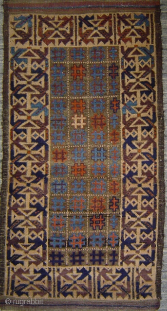 Symmetrically knotted Baluch mat, crisp design, vivid coloratura, 26 x 47 [53] inches. Excellent condition, Early 20th century.               