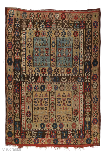 Unusual Antique Anatolian small kelim with Turkmen ensi-like design, 50 x 72 inches. Small old reweave at upper left corner; small holes, corroded browns; rough sides. Mounted on corduroy backing. Published in  ...
