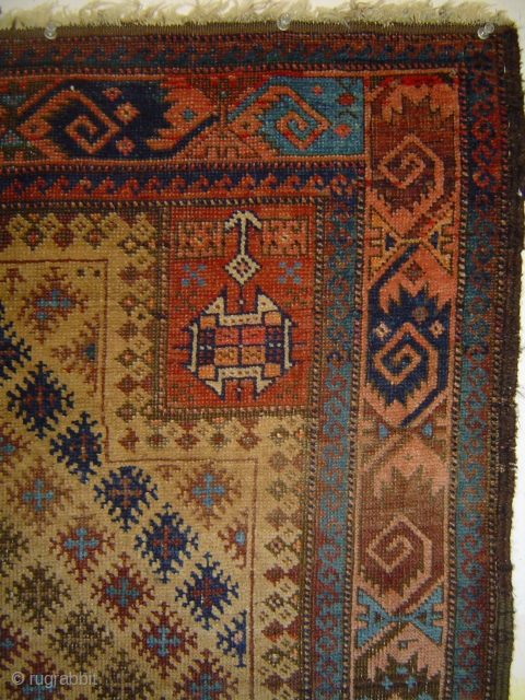 Singular Baluch prayer rug, with 159 snowflake stars in a staggered repeat on the camel field. 34 x 54 inches. Each star contains a small "cross le-boutonnee". Dramatic use of a sizzling  ...