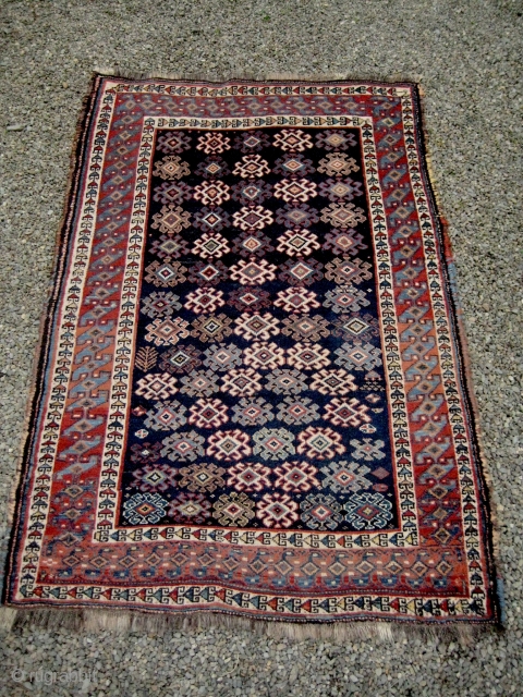 Luri rug, late 19th or early 20th century, with pleasing asymmetry within a reticent and elegant composition. Some minor flaws in its condition, but good overall. 1.85 x 1.30m.    