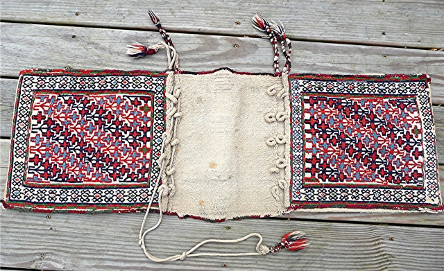 Antique Caucasian Flatwoven Saddlebag with extra weft wrapping
Circa 1900
3ft 4ins x 1ft 2ins
Complete with no repairs                 