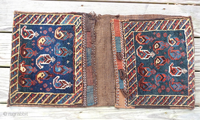 Antique Kurdistan Knotted Saddlebag (Complete)
Early 20th Century 
Full piled with natural dyes
Slightly Dog eared on 3 corners

                