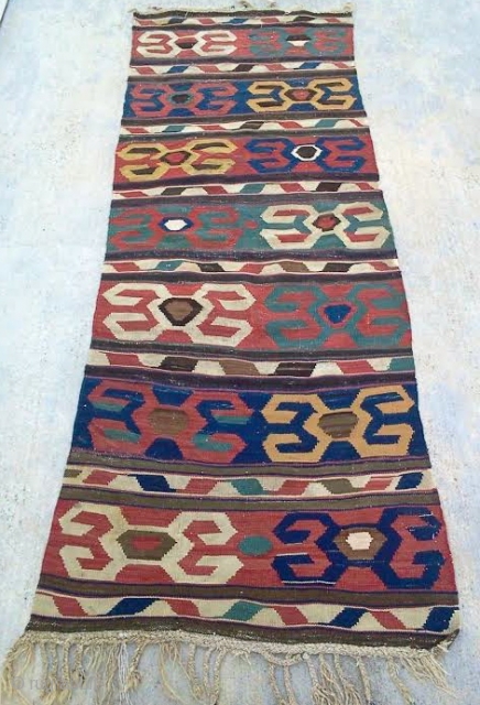 Caucasian Kazak Kilim, late 19th c., 2' 7'' x 6' 7'', Exquisite color contrasts and dynamic large-scale motifs.               