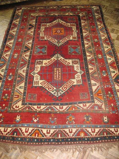 New to our collection is this beautiful antique Caucasian Kazak circa 1880.  This carpet is good condition with no previous repairs.  There are a few areas worn down to the  ...