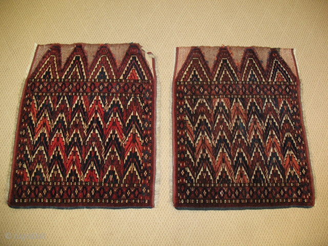 This is a pair of antique Turkoman Okbashs circa 1880. These are in excellent condition minus a few curling corners. Size 1.9x2.3 each          