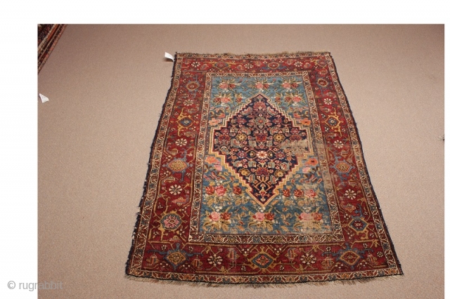 Persian rug with Kurdish characteristics and Bidjar format from the 4th
quarter of the 19th century. Unusual and attractive combination of design
and colors. Condition - wear in middle. (Dimensions: 4'5" X 6') #5315 