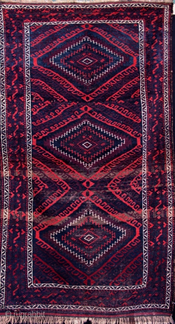#1604

 Sistan Belouch rug with good pile and intensely saturated colors--
including a very intense dark true aubergine. Turn of the
19th century. (Dimensions 3'2" X 5'6")        