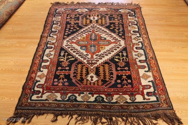 Really nice little Bakhtiari that measures 4'9"x6'4" and in fantastic original condition. Drawn really well with natural dyes and cool willows and human figures. It needs a wash and vacuum but that's  ...