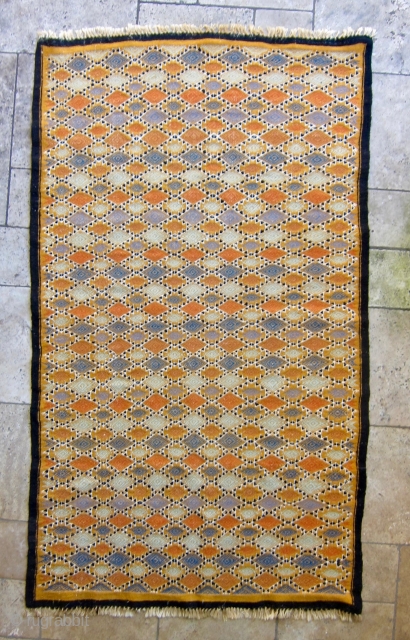 SOLD - Mergoum - flatweave kilim rug from Southern Tunisia, Gouvernement Tataouine. Late 20th century. Vibrant combination of mainly vegetable dyed wool, some synthetic dyed wool in the embroidery, and undyed black  ...