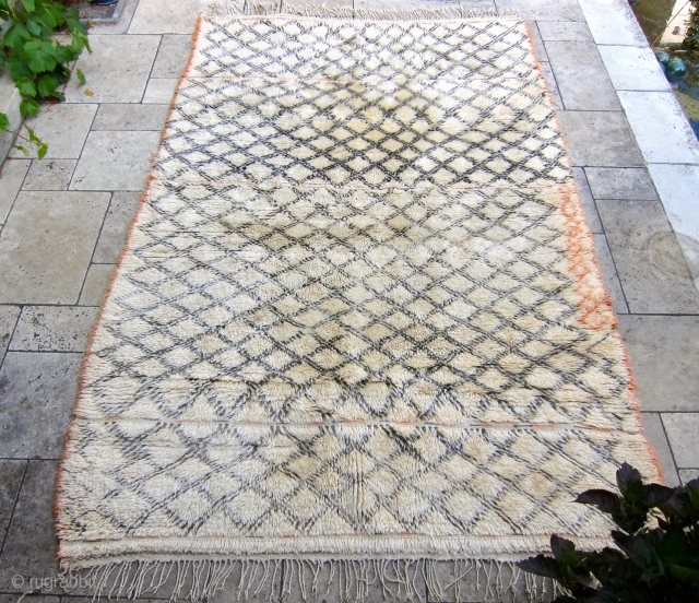 SOLD  - A truly mid-century Beni Ouarain rug. This beautiful rug was begun in 1953 and finished in 1955. Stored away between hosting guests, it was well cared for, and is  ...