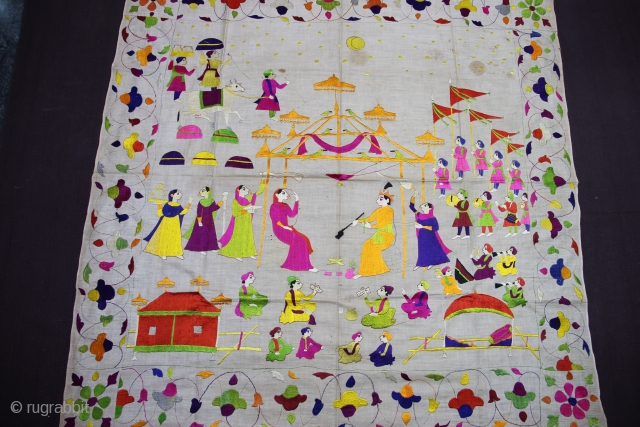 Chamba Rumaal.

A rare Rumaal hand-embroidered in the typical style of Chamba, Himchal Pradesh, India.

This Rumaal depicts a Wedding Ceremony, with the bride and gore sat under a tent, several attendants, palanquins, musicians,  ...