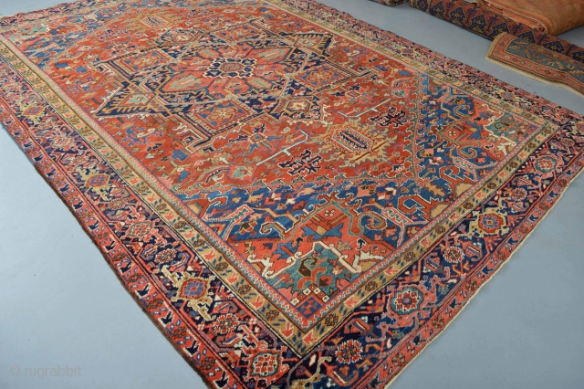 Music for the eyes circa 1920's Heriz area rug  Beautiful natural colors aproximately 370 x 260 centimeters. good pile some low spots
washed and cleaned ready for use     