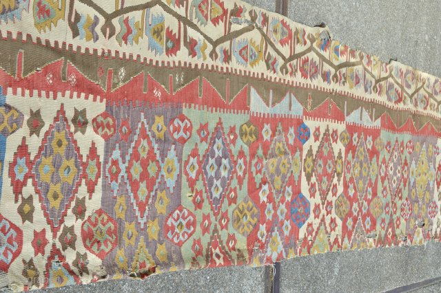 Music for the eyes colours of a central Anatolian Kilim fragment 
first half 19th century as found as is great sized fragment about 390 x 90 cm 
     