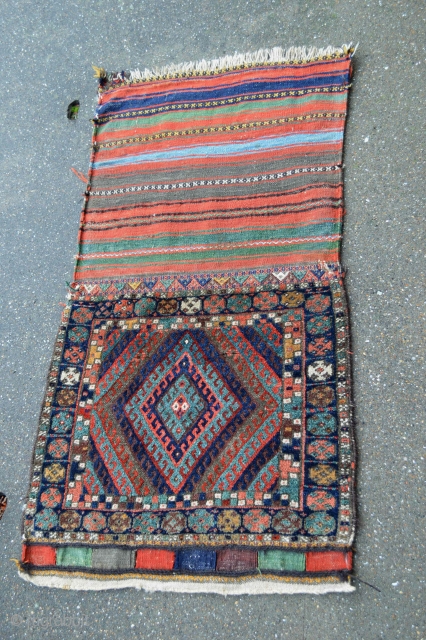 Beautiful Antique Senjabi Jaf Kurd Bagface with original kilim back  . Full Pile. Variable use technique as knoted pile ,soumak and kilim.
size with kilim back 3.77 x 2.20 feet or aprox  ...