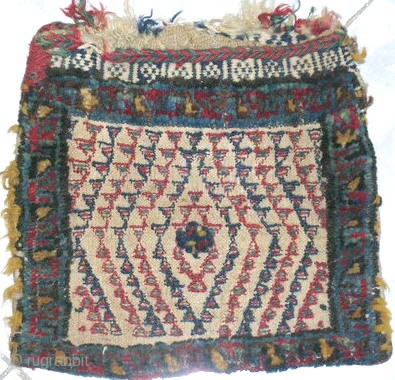 small bag with mixed neddle work,carpet knotted on kilim base,size 027cmx026cm circa 1900 wool on wool,all natural colors no any restoration or damages.
origin Cetral of Persia at Fars province.    