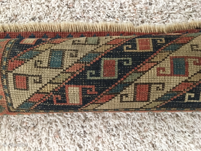 Antique Kazak Prayer Signed & dated

36" X 51" Antique Kazak Prayer rug turn of century in good overall condition for age.  Needs to be cleaned.  Has woven date and prayer  ...