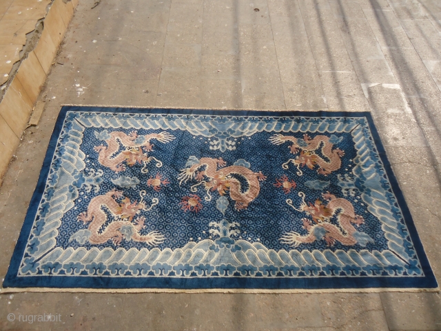 Chinese or Tibet Rug with Dragons,very nice rug with great colors and design,very soft shiny wool.Excellent condition.good age.Size 7'*4ft.E.mail for more info and pics.         