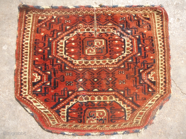 Turkmon Saddle Rug with nice colors and design,good age and fine weave.Size 1'10"*1'6".E.mail for more info and pics.               